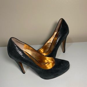 BCBGeneration snake skin black pumps